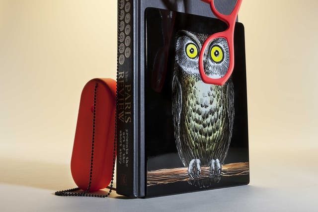 'Civetti' book ends by Fornasetti, £300, Liberty; 'Object Lessons: The Paris Review Presents the Art of the Short Story', £20, Random House; reading glasses by Pedlars, £25.50, Selfridges