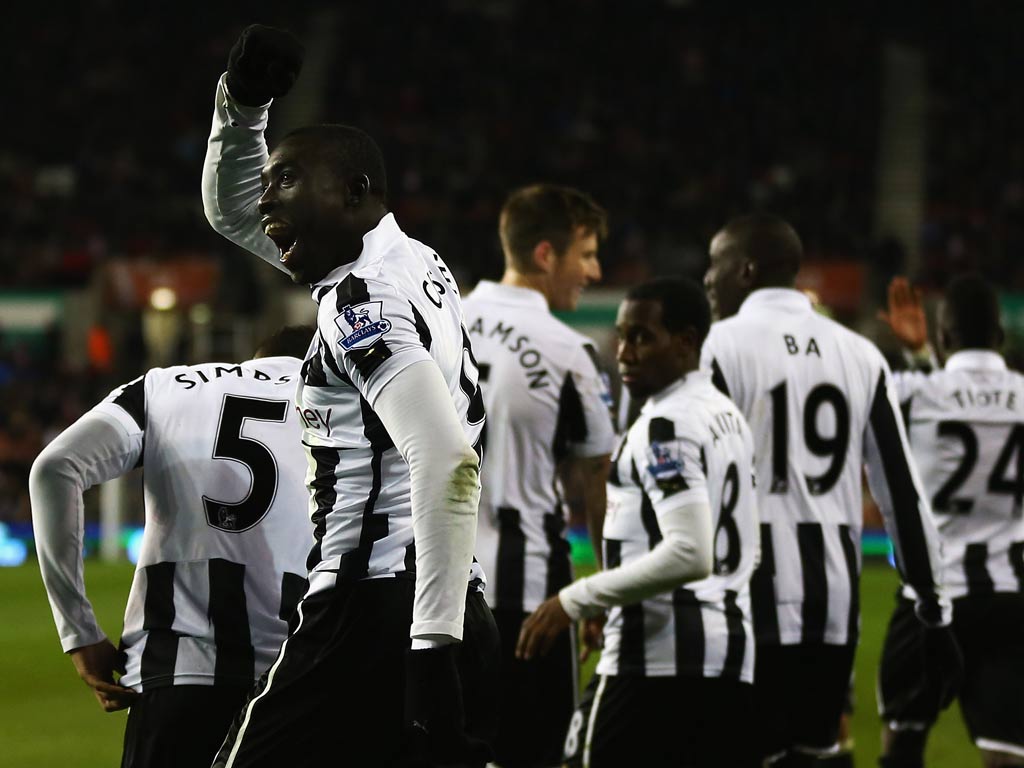 Papiss Cisse of Newcastle celebrates his goal against Stoke