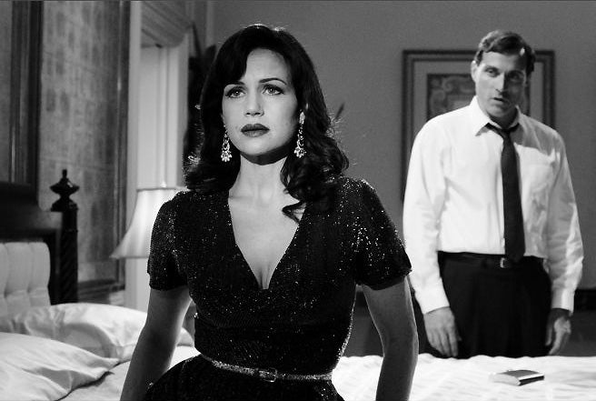 In the black: Carla Gugino and Rufus Sewell in Hotel Noir