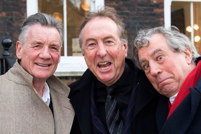 Michael Palin, Eric Idle and Terry Jones of Monty Python pose together ahead of a legal case at the High Court in a dispute over the hit musical Spamalot on November 30
