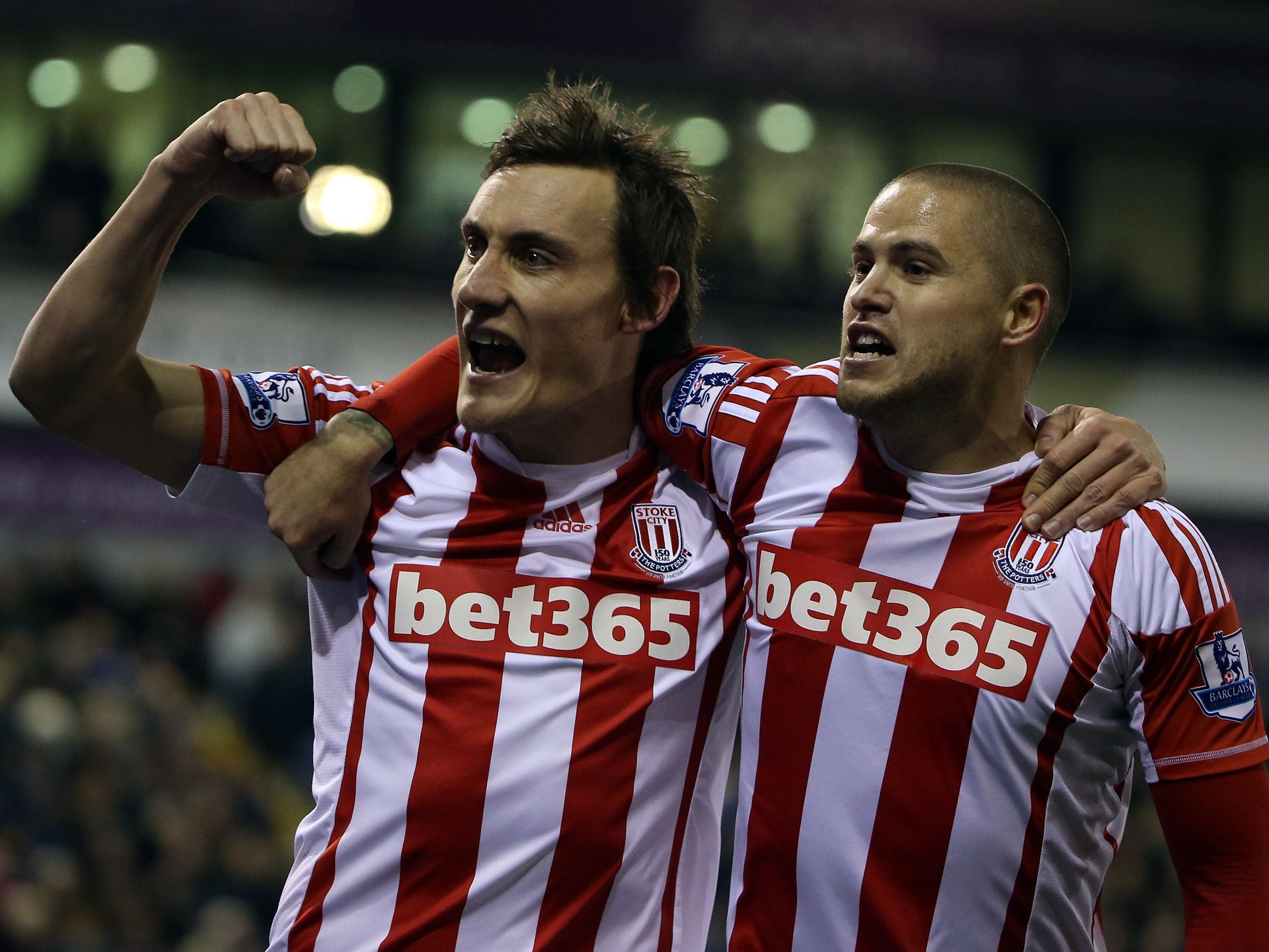 Dean Whitehead and Michael Kightly celebrate Stoke's goal