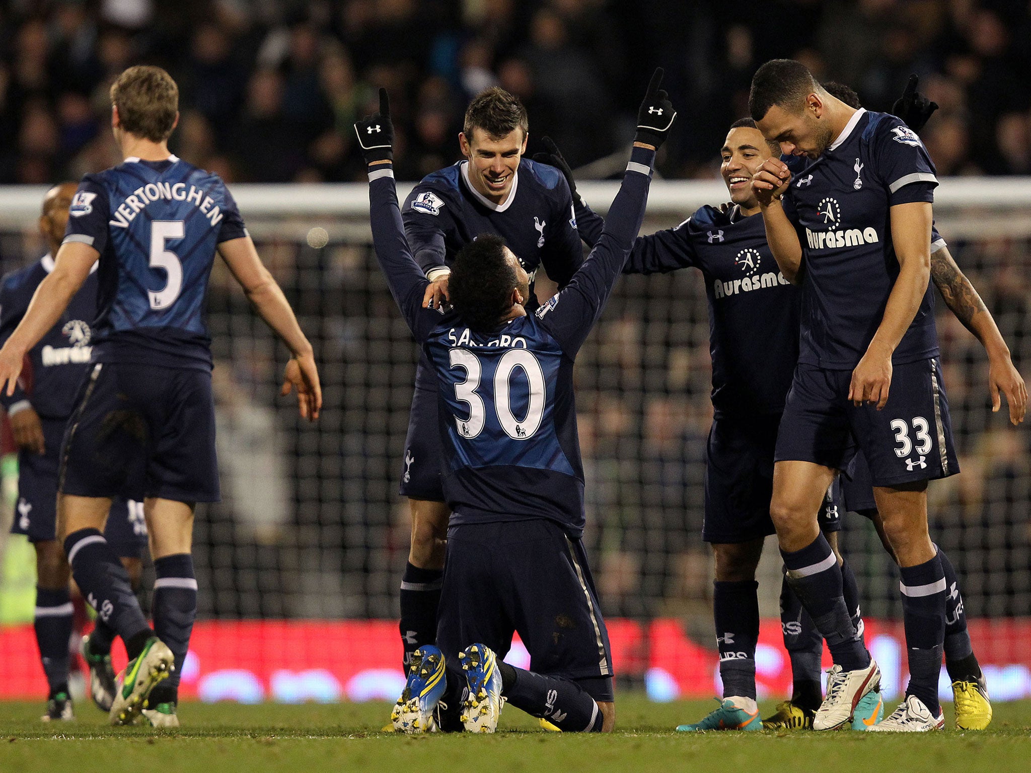 Sandro celebrates his goal for Spurs alongside his teammates