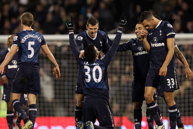 Sandro celebrates his goal for Spurs alongside his teammates