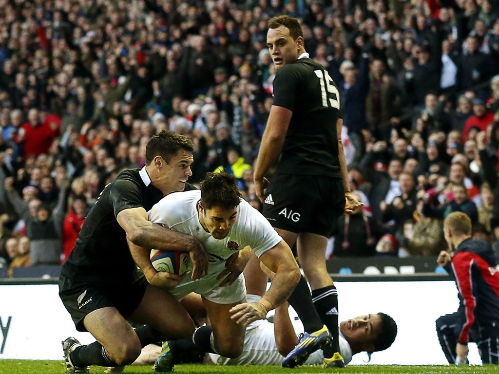 Over and out: Brad Barritt scores one of the tries that helped England pull off an impressive and famous victory over the All Blacks