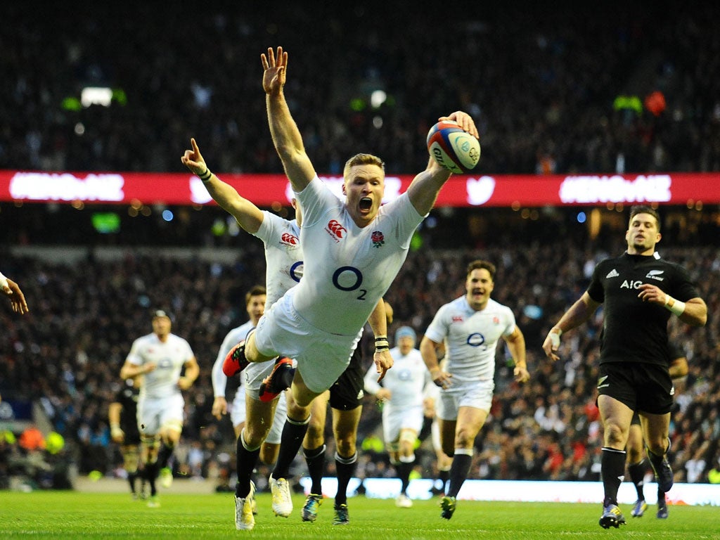 Chris Ashton dives in trademark fashion for one of England’s tries against New Zealand