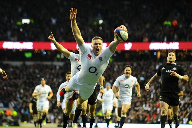 Chris Ashton dives in trademark fashion for one of England’s tries against New Zealand
