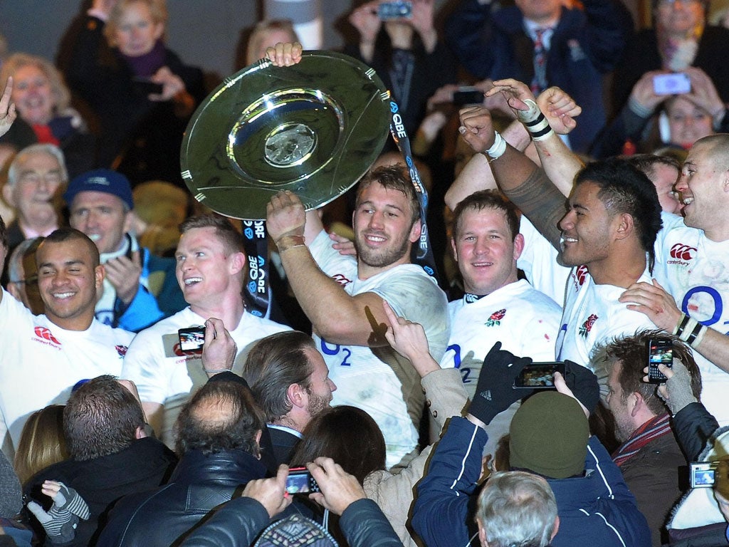 England’s captain Chris Robshaw celebrates victory with the Hillary Shield