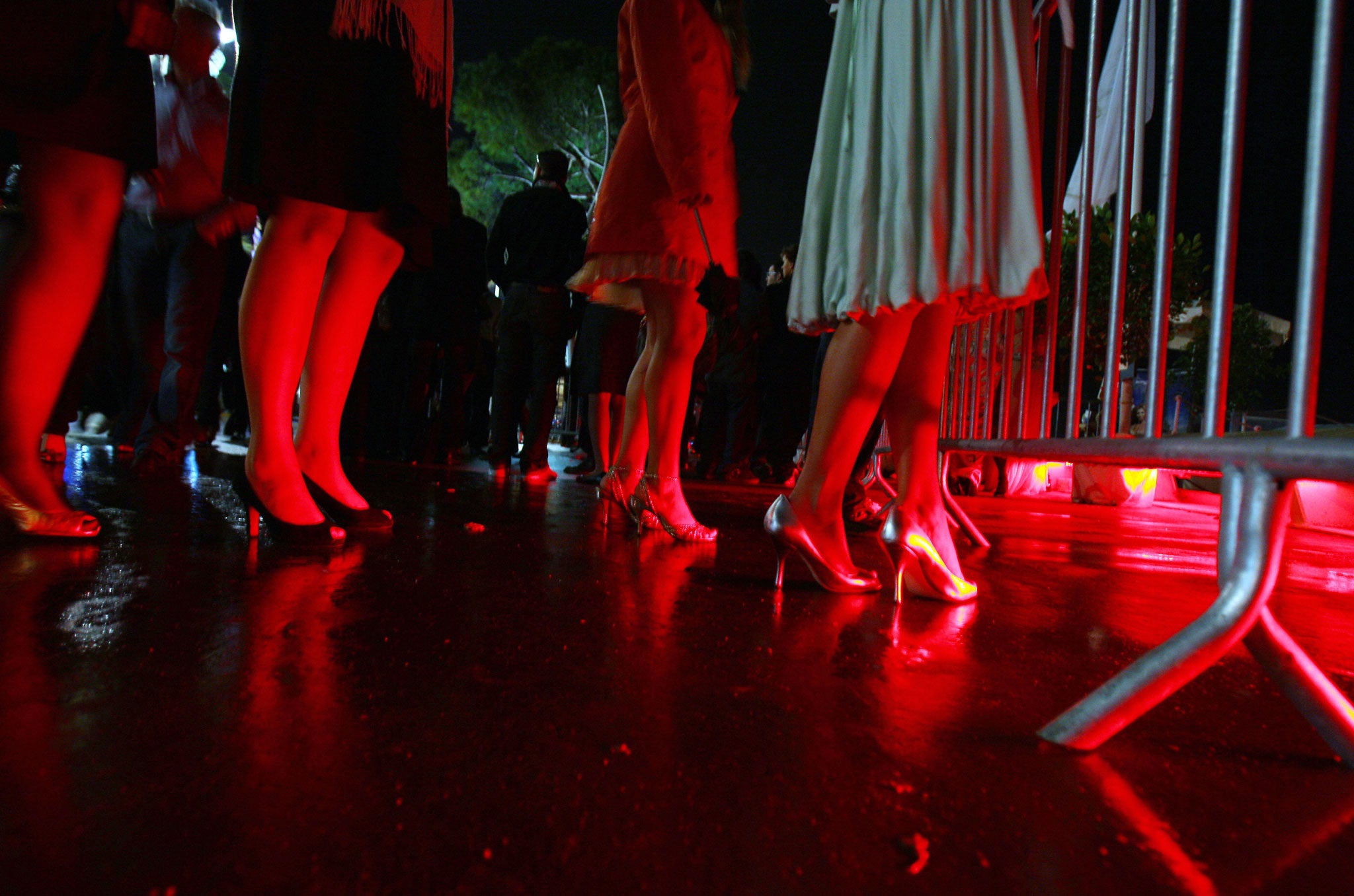 Women arrive to enter a nightclub during the 61st Cannes International Film Festival on May 17, 2008 in Cannes, southern France.