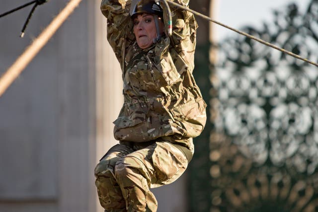 Presenter Lorraine Kelly descends the zip line toward the Royal Marine saftey crew from Wellington Arch in Central London, to launch the annual Christmas Box campaign for the Armed Forces, run by the charity uk4u Thanks! 