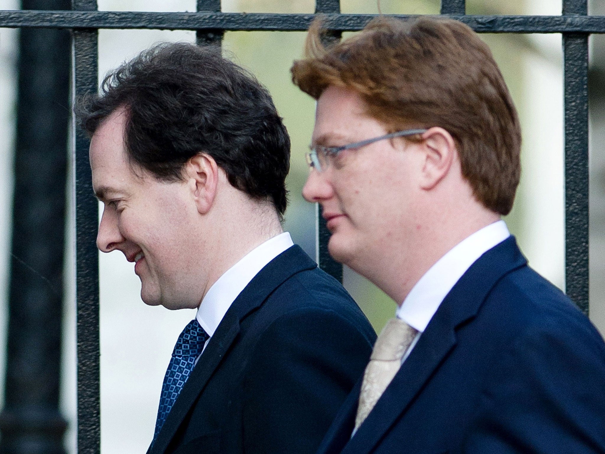 Chancellor of the Exchequer George Osborne (left) and Chief secretary to the treasury Danny Alexander leave number 11, Downing Street