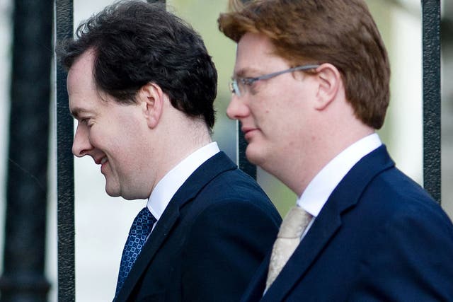 Chancellor of the Exchequer George Osborne (left) and Chief secretary to the treasury Danny Alexander leave number 11, Downing Street