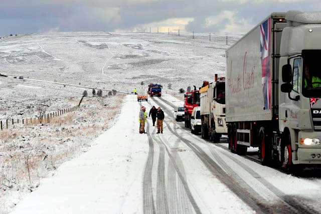 Stranded motorists on the A169 high up on the North York Moors near Goathland, North Yorkshire as snow fell across the UK
