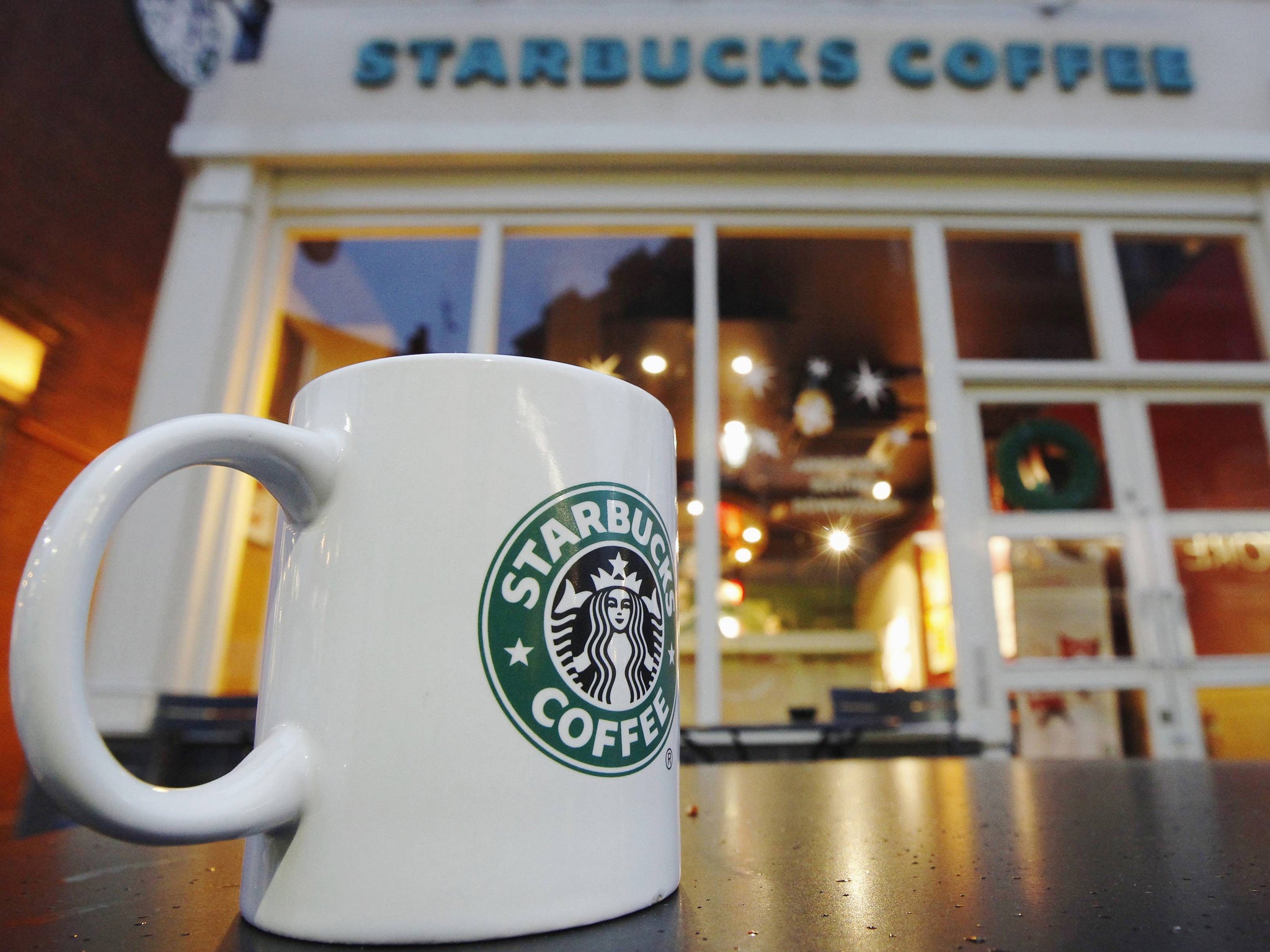 Starbucks UK managing director Kris Engskov told the London Chamber of Commerce that changes to its tax arrangements will see the firm pay above what is required by law