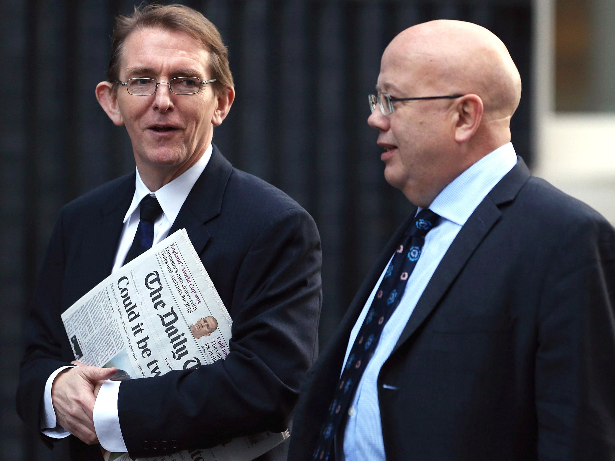 Editor of The Independent Chris Blackhurst, right, arrives for Tuesday's meeting with other newspaper editors and David Cameron alongside Telegraph editor Tony Gallagher