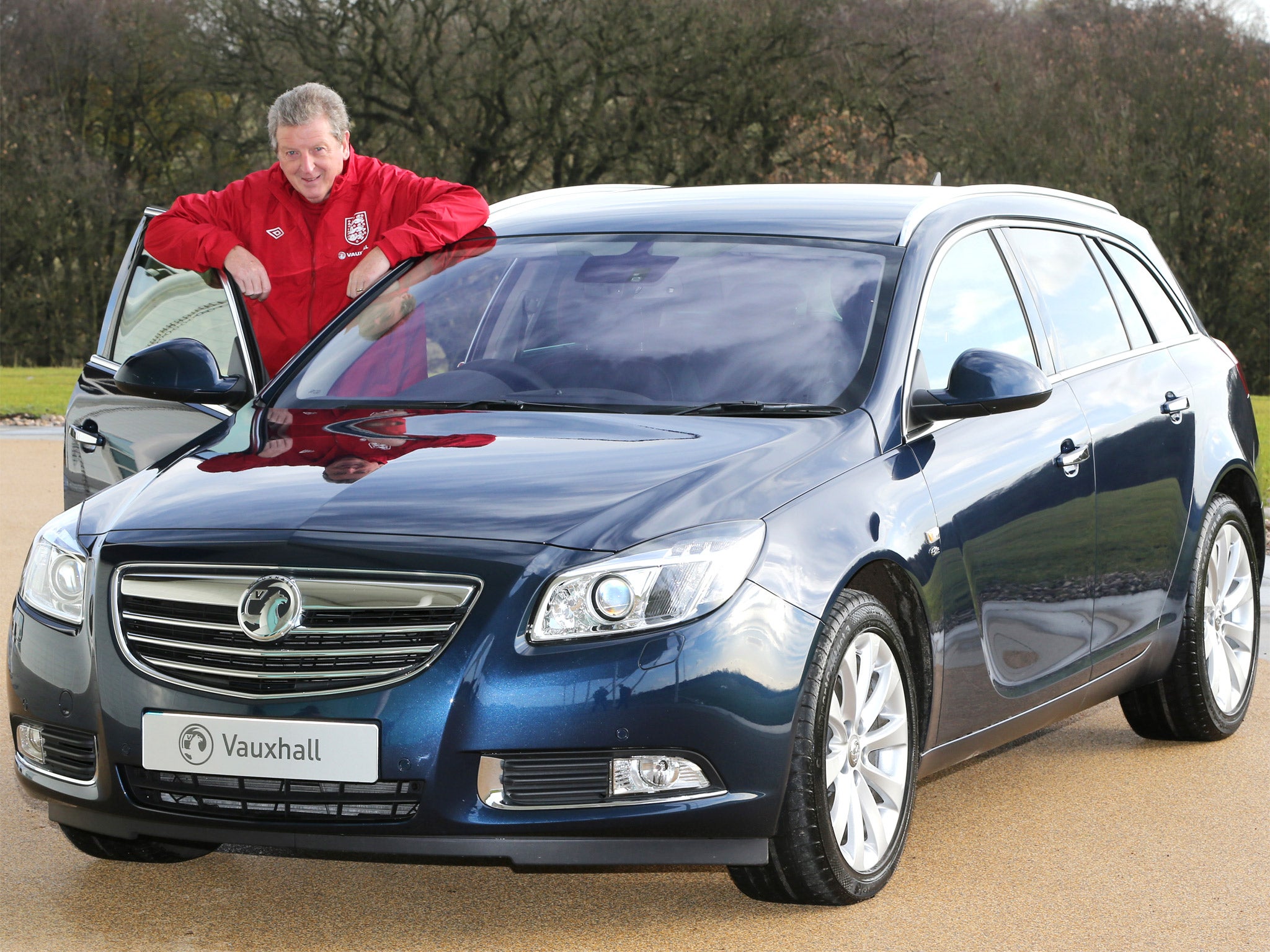 Sensible choice: Roy Hodgson and his shiny new Vauxhall Insignia