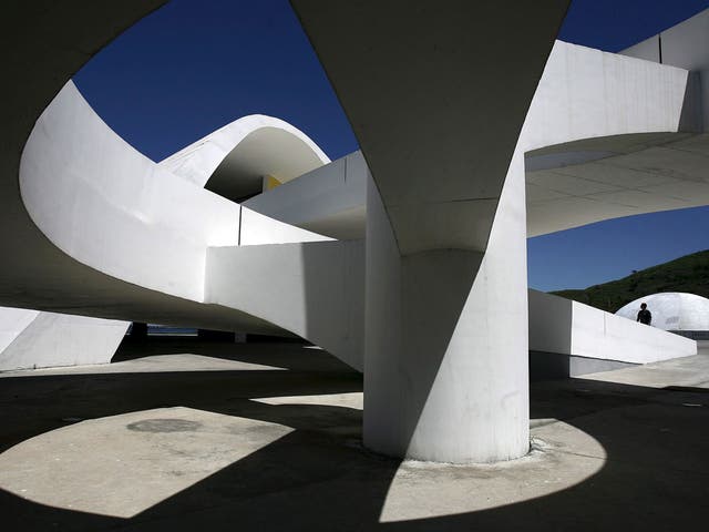 <p><strong>The Niteroi Museum of Contemporary  Art</strong></p>
<p>The flying saucer-shaped museum in Rio de Janeiro, which was
completed in 1996, has stunning views over Guanabara Bay and Sugarloaf
Mountain. Niemeyer worked with structural engineer Bruno Contarini to make the
16m high building, with a cupola 50m in diameter. His vision for the museum,
originally sketched out on a restaurant tablecloth, was one of &#x201c;rising upward,
like a flower, or a bird.&#x201d;</p>
<p>Mr Chapman said: &#x201c;The museum does look like it was dropped from
outer space.&#x201d;  While he does not rate the building as one of Niemeyer&#x2019;s
finest, he added: &#x201c;It is in the most stunning location. The setting and the
approach to the building are very dramatic.&#x201d;</p>