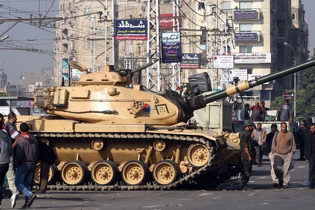 An Egyptian army tank near the presidential palace yesterday