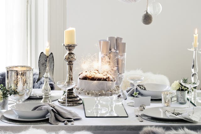 White out: Keep the table free for food by hanging decorations from the ceiling or light fittings. From £4, thewhitecompany.com