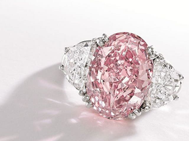 Fancy Intense Pink Diamond and Diamond Ring, Oscar Heyman
& Brothers sold for $8,594,500