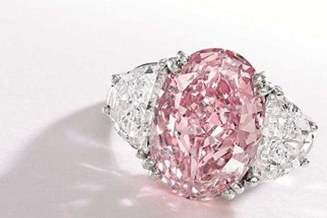 Fancy Intense Pink Diamond and Diamond Ring, Oscar Heyman
& Brothers sold for $8,594,500