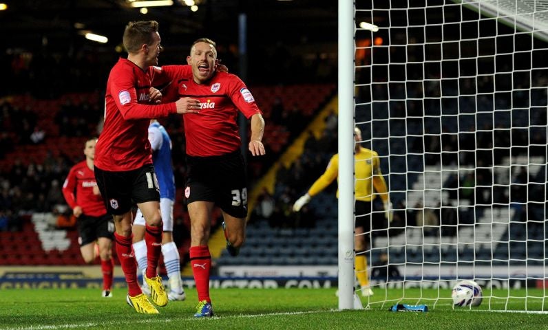 Craig Bellamy celebrates scoring Cardiff’s second against his old club
