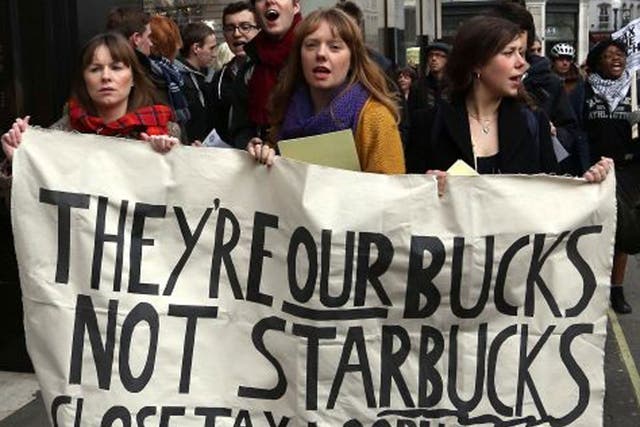 UK Uncut activists protesting against Starbucks's tax arrangements