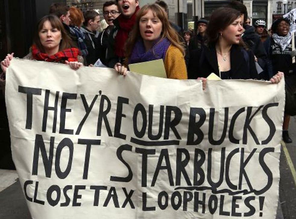 UK Uncut activists protesting against Starbucks's tax arrangements