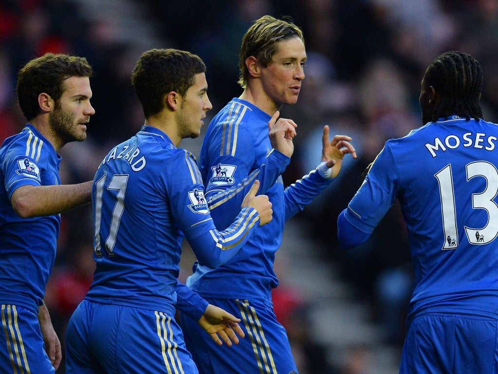 Chelsea's Spanish forward Fernando Torres (2R) celebrates with teammates Spanish striker Juan Mata, Belgian midfielder Eden Hazard and Nigerian midfielder Victor Moses