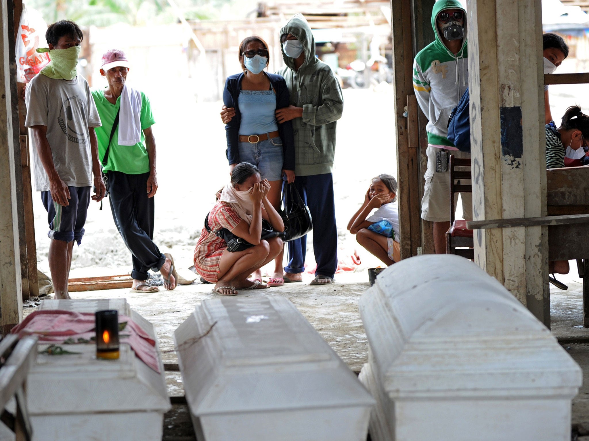 Coffins at the market in New Bataan yesterday