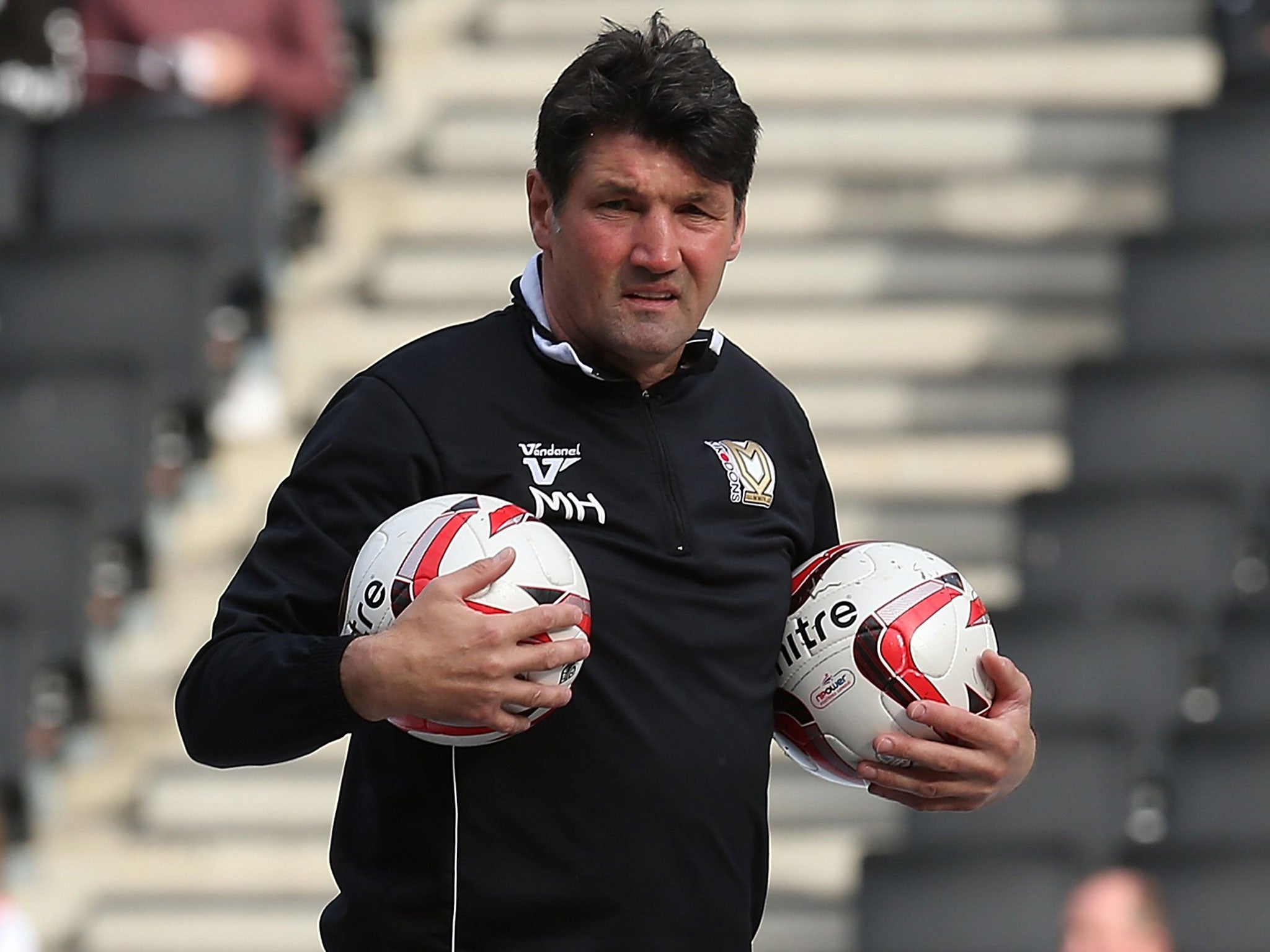 Turf luck: Mick Harford hit an own goal in Luton’s last match on plastic