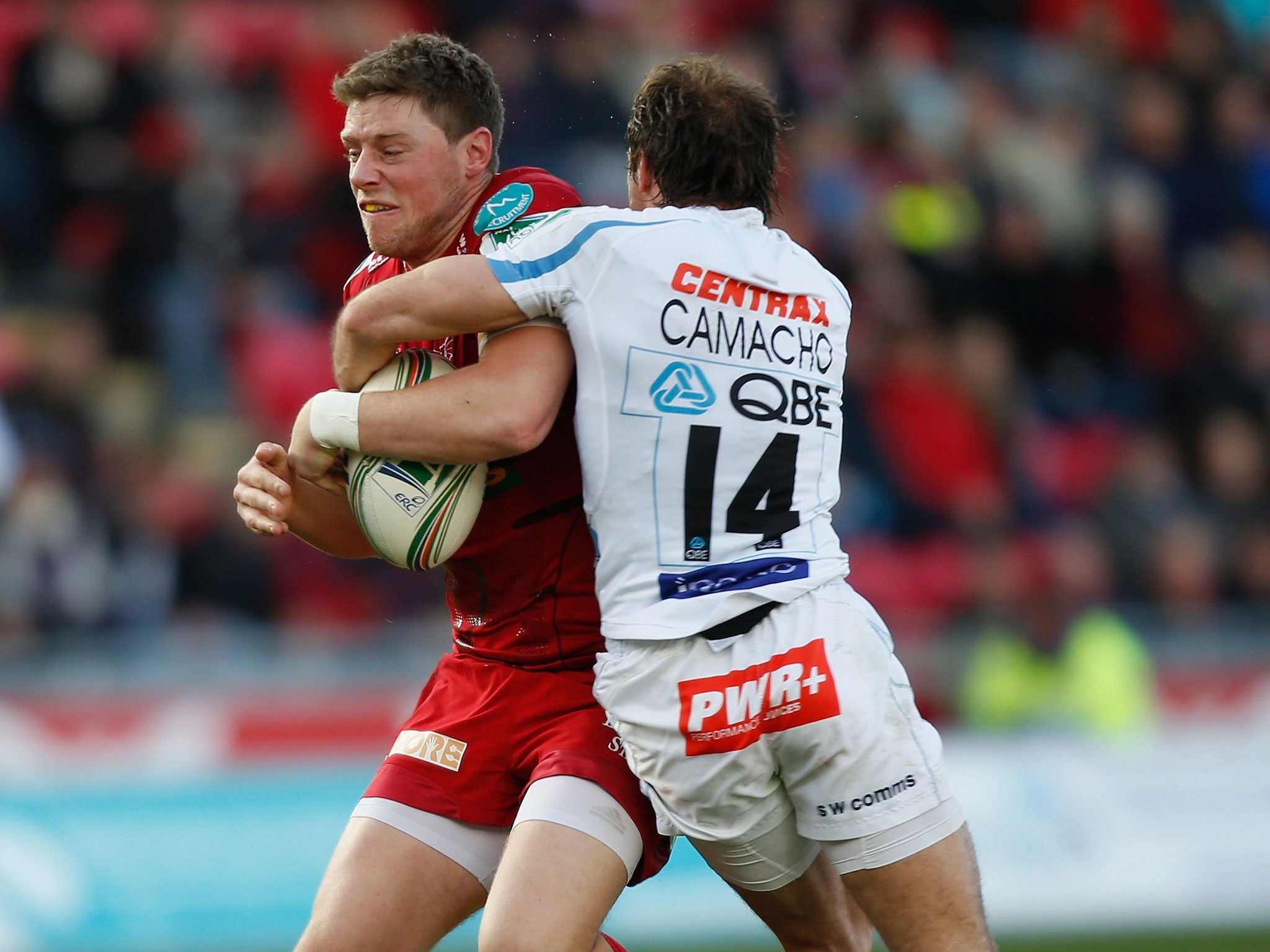 Rhys Priestland (on left in picture) was carried off on a stretcher early in the second half after slipping as he ran into contact