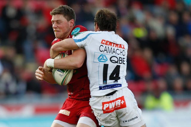 Rhys Priestland (on left in picture) was carried off on a stretcher early in the second half after slipping as he ran into contact