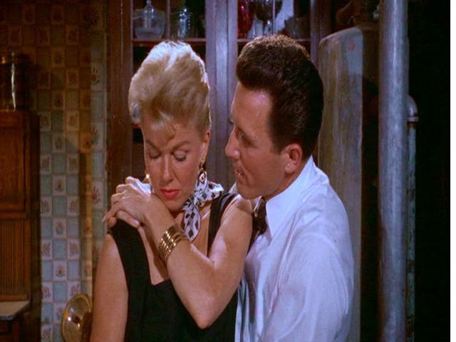 Arm’s length: Doris Day and John Raitt in the 1957 romantic comedy The Pajama Game