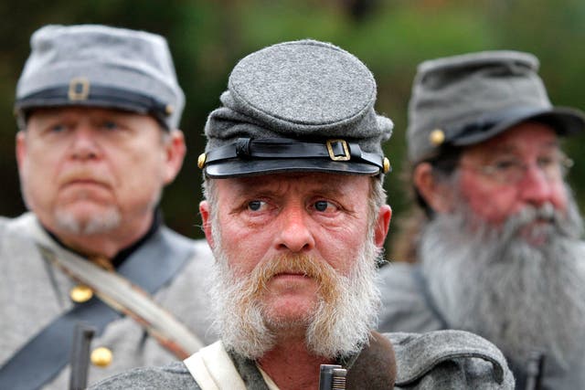 Soldiers take part in a re-enactment at Fredericksburg, Virginia to mark the 150th anniversary of the Civil War battle that took place in and around the town.