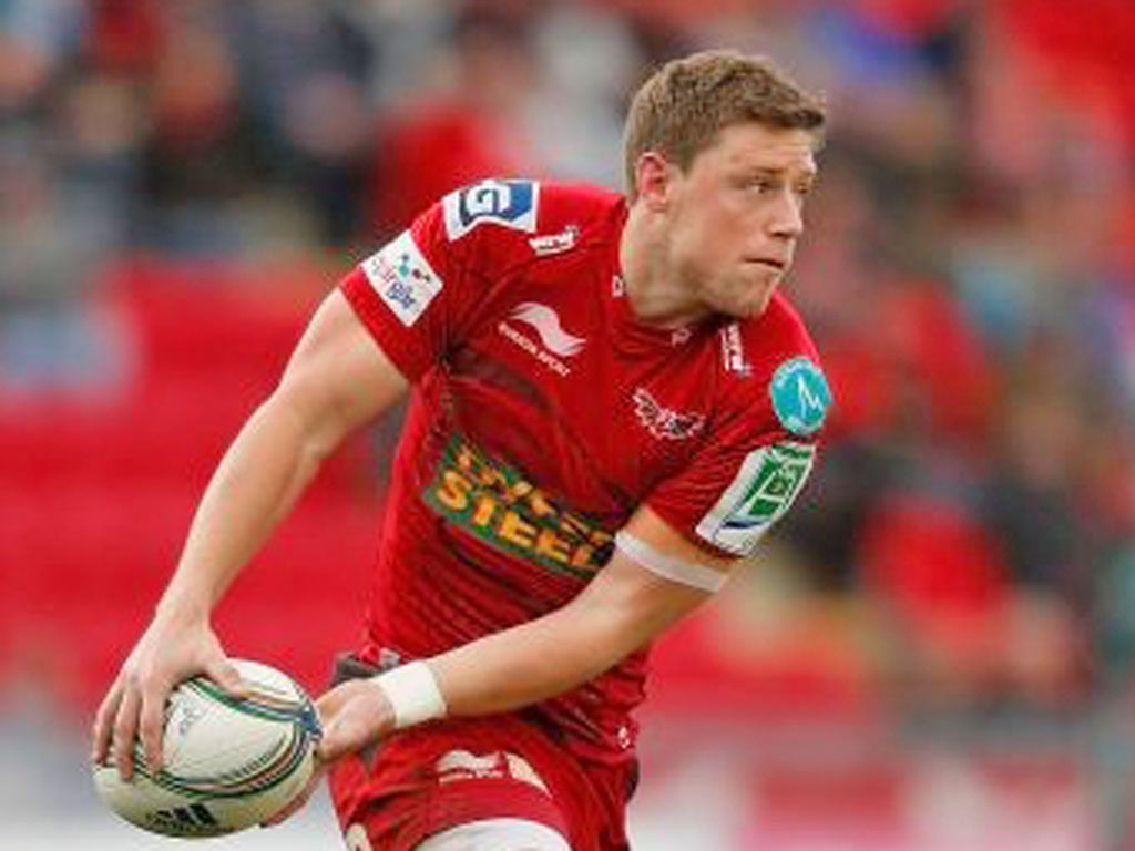 Scarlets’ Rhys Priestland in action before he was carried off