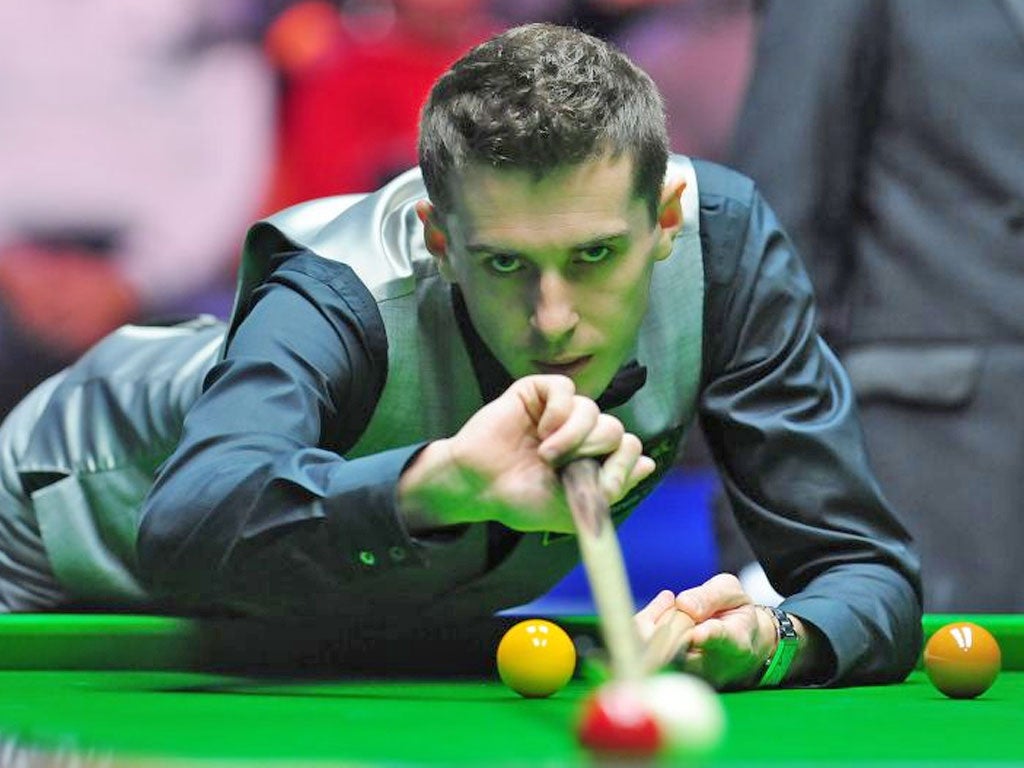 Mark Selby lines-up a red at the York Barbican yesterday