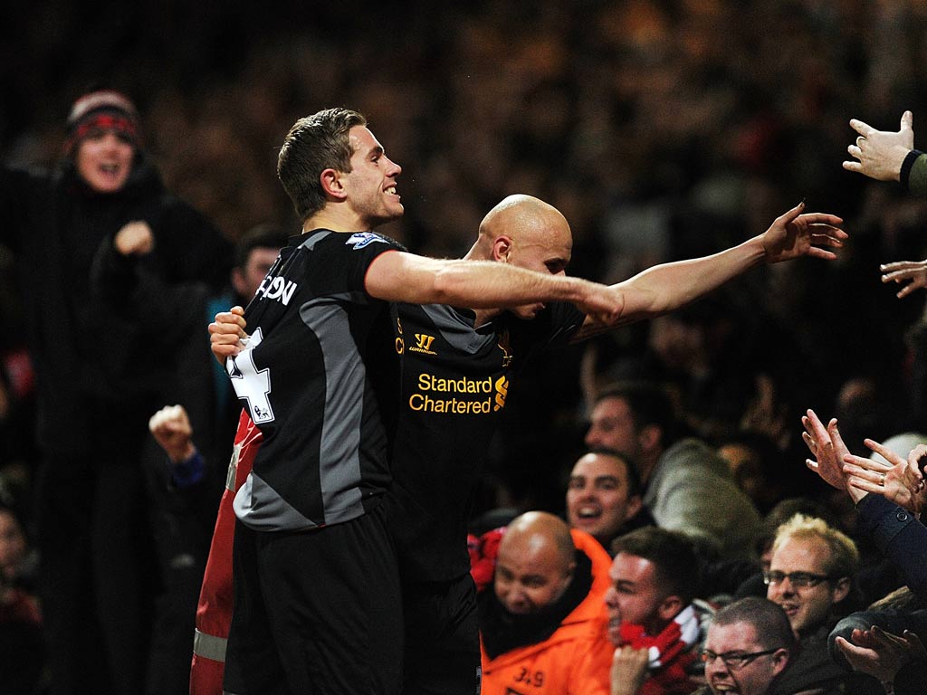 Jonjo Shelvey of Liverpool celebrates after James Collins of West Ham scored an own goal