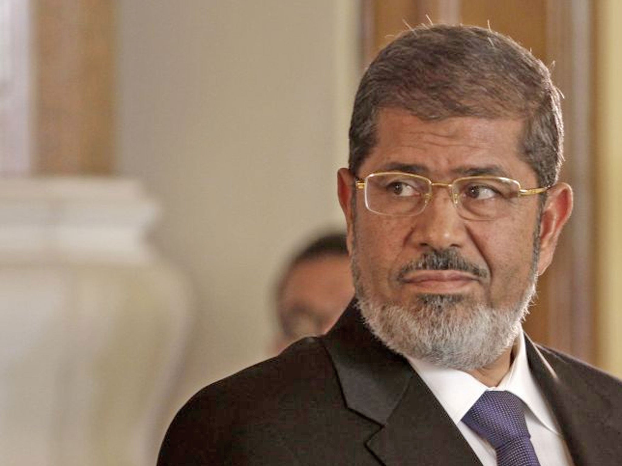Mohamed Morsi: The President’s Islamist allies hurriedly approved the constitution