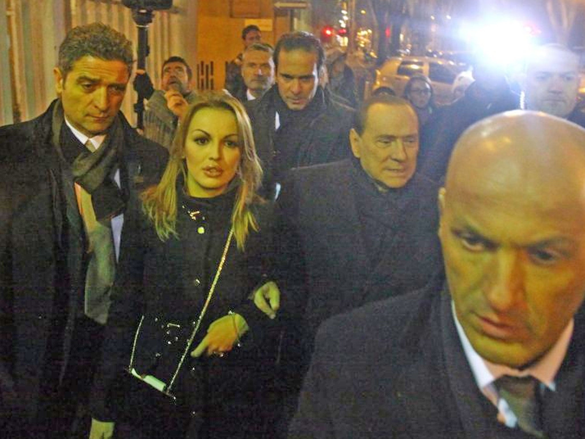 Silvio Berlusconi with his reported girlfriend, Francesca Pascale, after a PDL party meeting in Milan on Sunday night