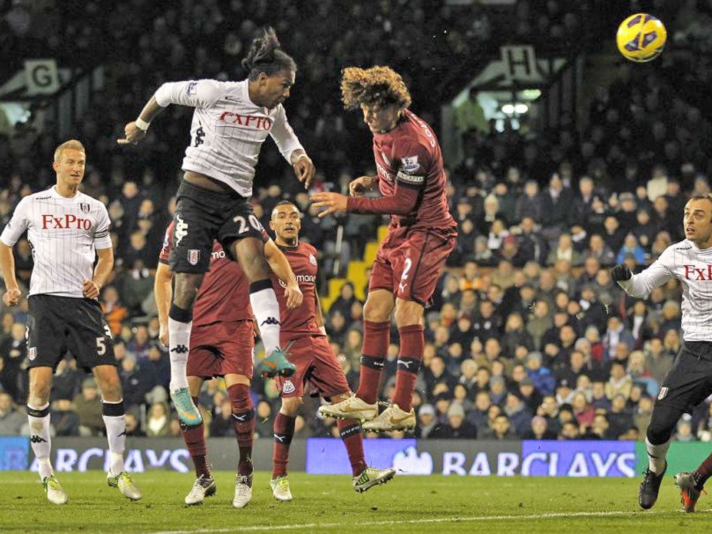 Hugo Rodallega gets above Fabricio Coloccini to head in Fulham’s winner