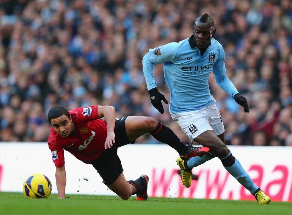Mario Balotelli in action in the Manchester derby