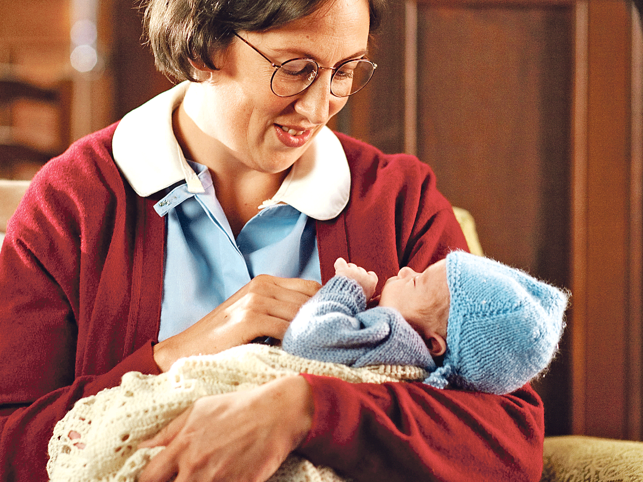 Holding the baby: Miranda Hart