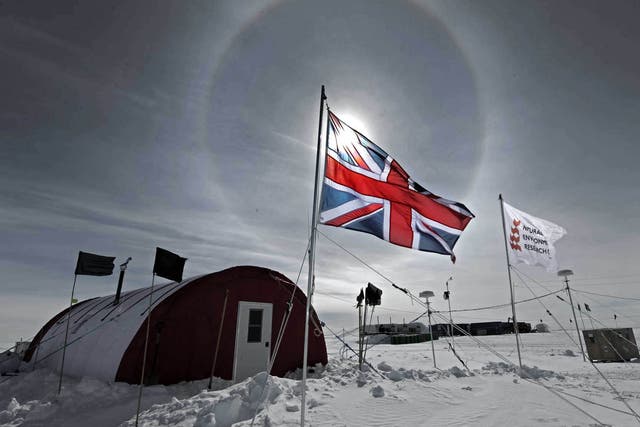 ANTARCTICA: The sun shines through a British flag over the field camp of the Lake Ellsworth drilling project in near the Ellsworth Mountains of Antarctica.

