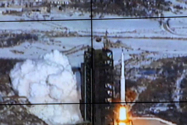 This picture received from North Korea's official Korean Central News Agency  on December 12, 2012 shows the rocket Unha-3, carrying the satellite Kwangmyongsong-3, being monitored on a large screen at a satellite control center in Cholsan county, North Pyongan province in North Korea. North Korea confirmed it had launched a long-range rocket and succeeded in its mission of placing a satellite into orbit.