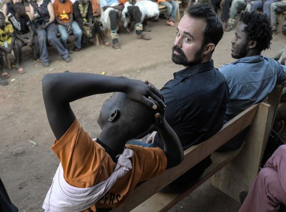 UNICEF Ambassador Ishmael Beah and Evgeny Lebedev speak to children who have been rescued by UNICEF from armed groups and are now receiving support at a transit centre in Bria where they can reclaim their childhoods and rebuild their lives.