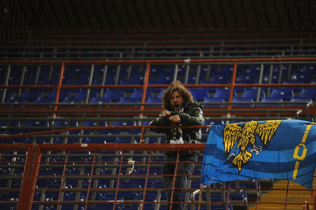 Arrigo Brovedani stands alone in the away stand for Sampdoria - Udinese