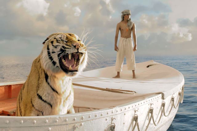 Uneasy truce: Suraj Sharma with his animal companions in Ang Lee's 'Life of Pi'