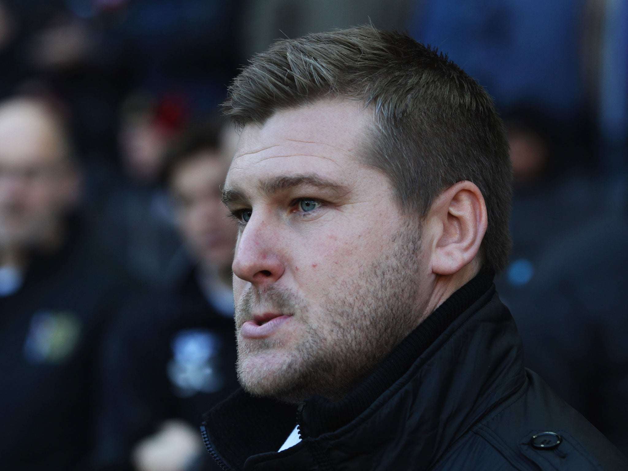 Karl Robinson manager of MK Dons looks on prior to the FA Cup with Budweiser Second Round match between MK Dons and AFC Wimbledon