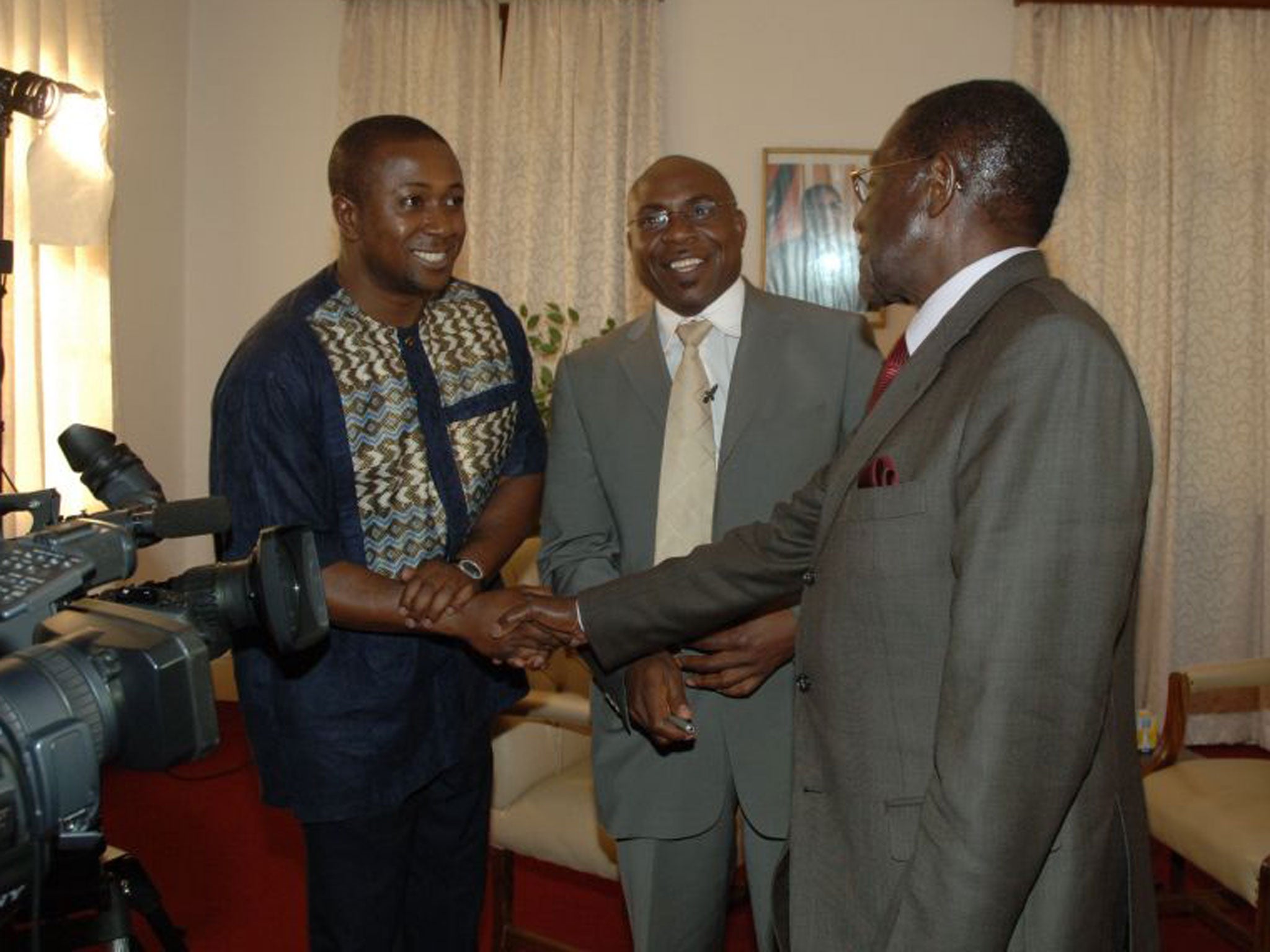 Roy Agyemang meeting President Mugabe in 2009