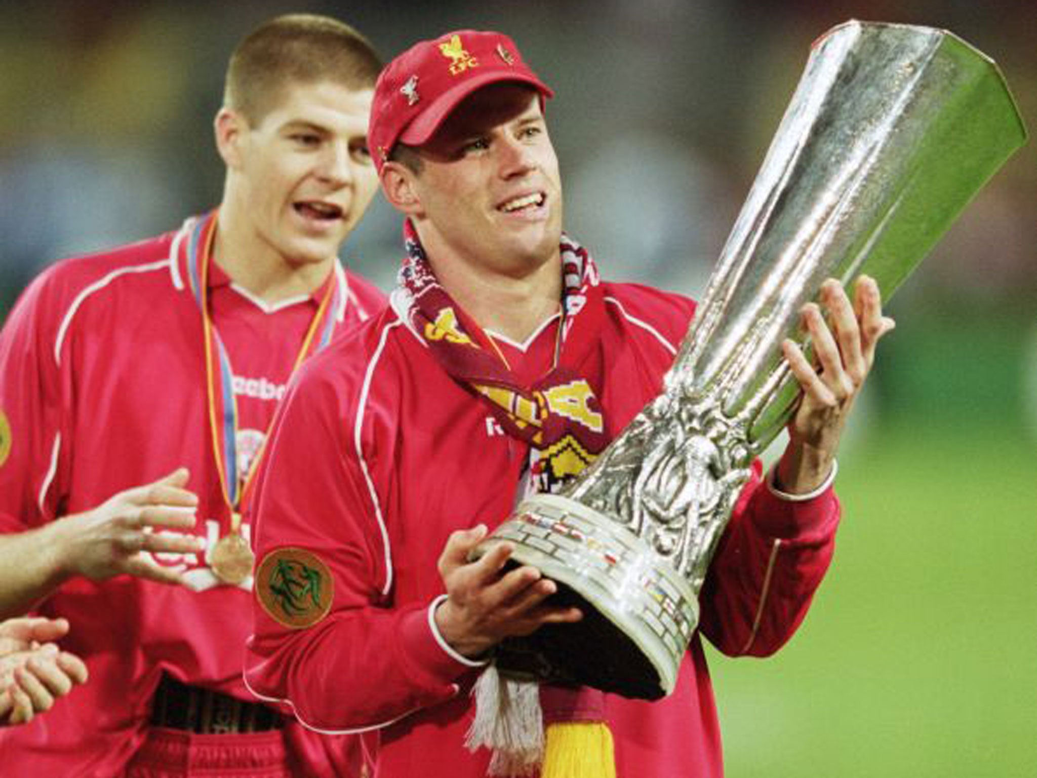 Liverpool’s Jamie Carragher, with Steven Gerrard in the background, after winning the Uefa Cup in 2001